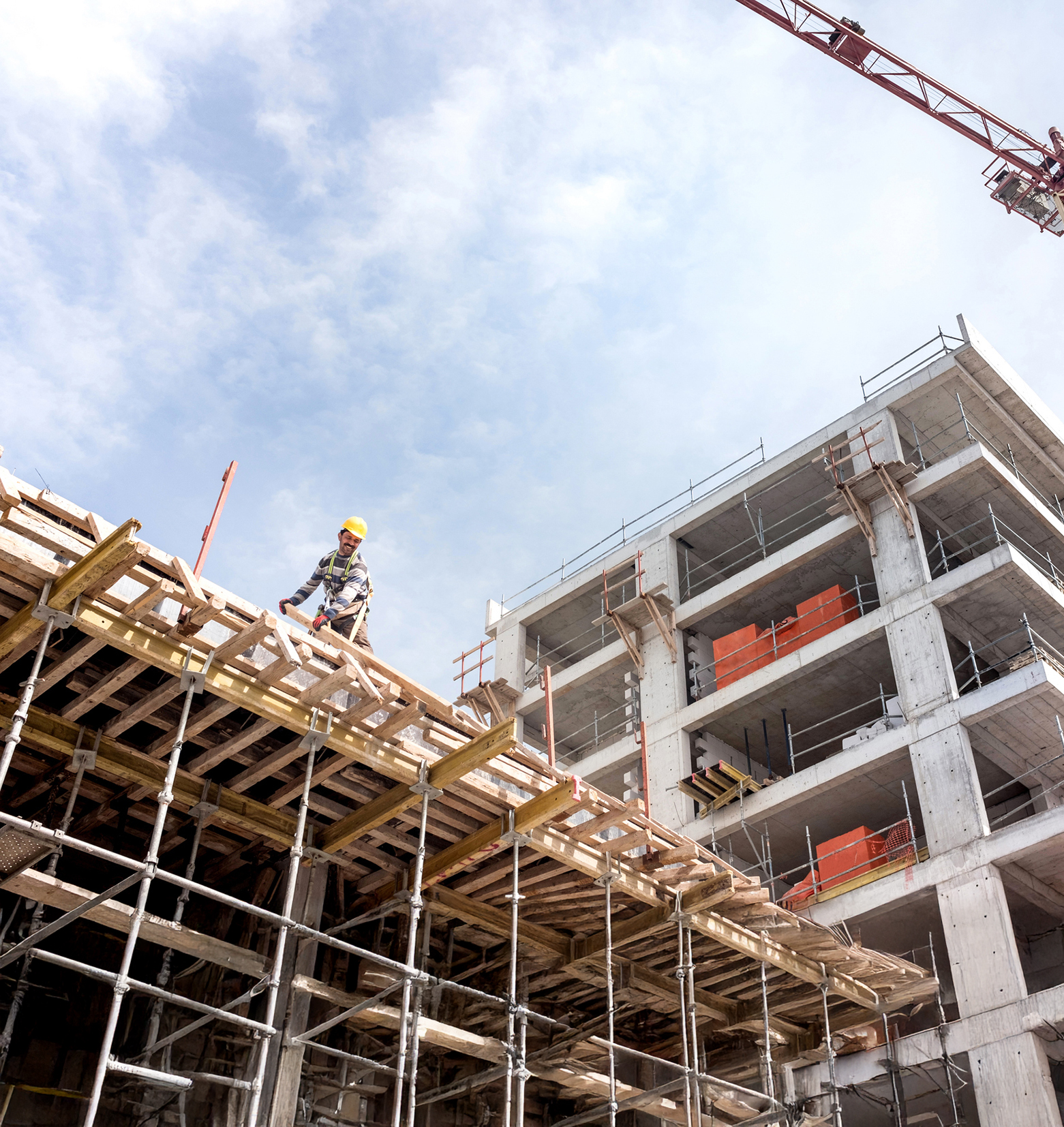 A new building is being constructed with use of tower crane