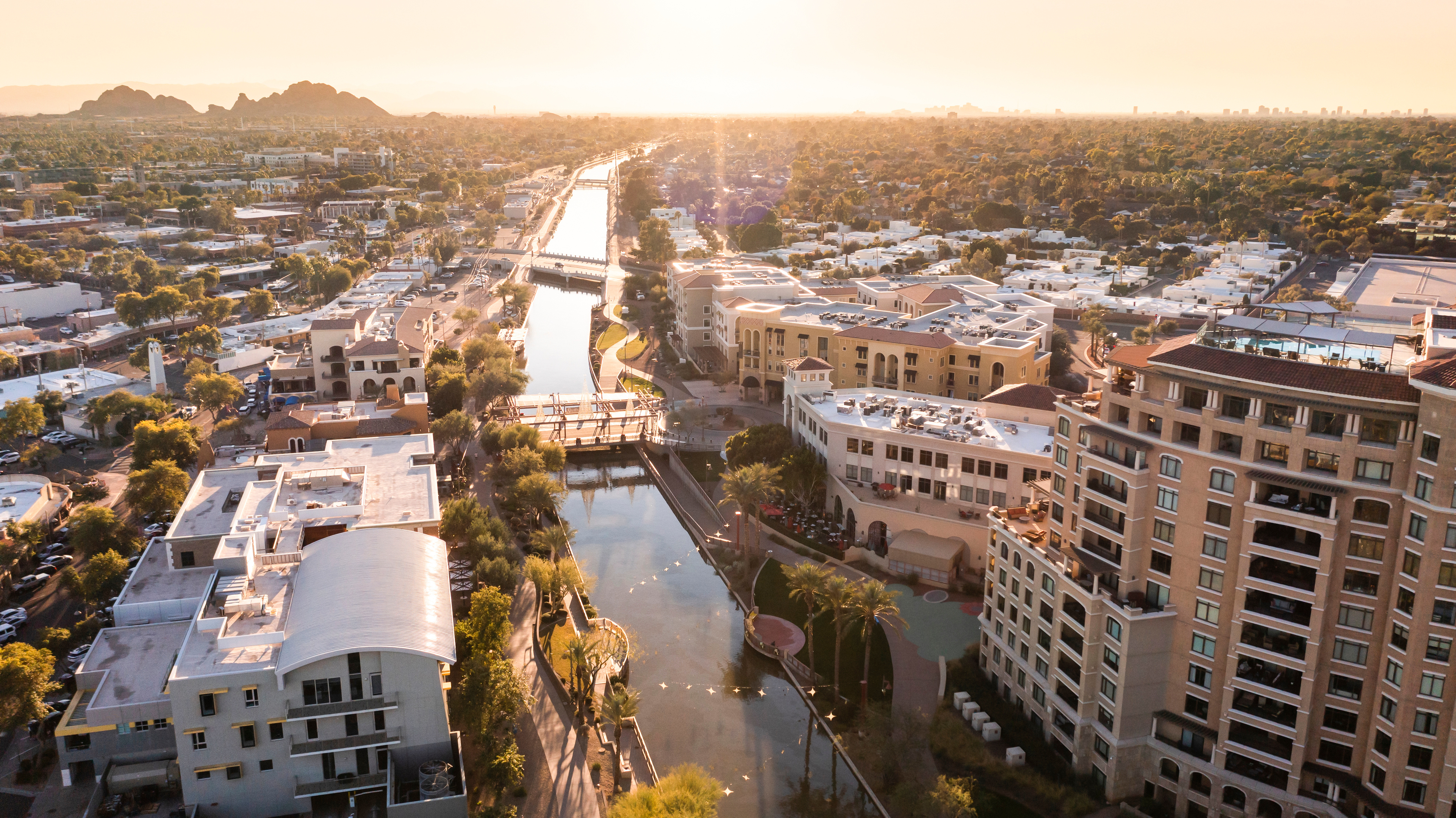 Aerial sunset view of the Salt River Canal and downtown area of